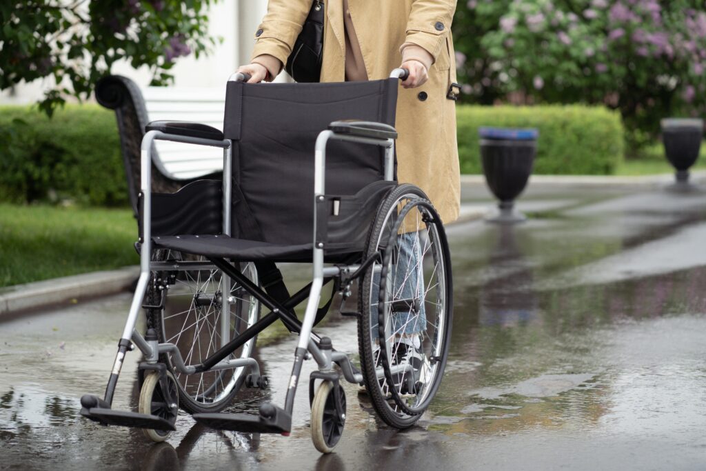 Person Pushing a Wheelchair